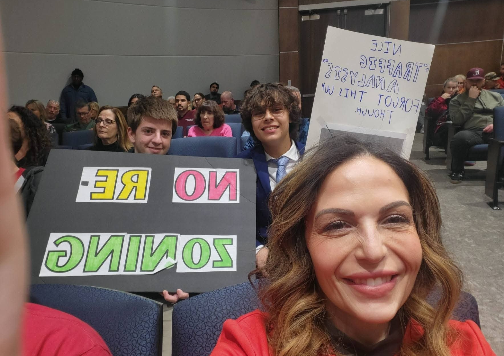 Niccole Pazos with Sunrise neighbors at a community meeting